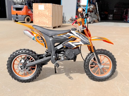 49cc Mini Motor Dirt Bike, Pocket Rocket, Pee Wee Motorcycle, ATV 50CC Engine for Kids in Orange 49cc Mini Motor Dirt Bike, Pocket Rocket, Pee Wee Motorcycle, ATV 50CC Engine for Kids in Orange