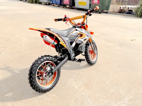 49cc Mini Motor Dirt Bike, Pocket Rocket, Pee Wee Motorcycle, ATV 50CC Engine for Kids in Orange 49cc Mini Motor Dirt Bike, Pocket Rocket, Pee Wee Motorcycle, ATV 50CC Engine for Kids in Orange
