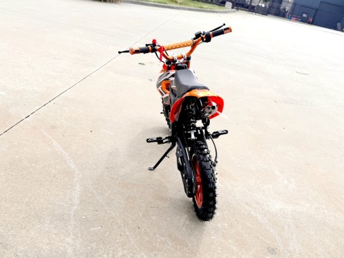 49cc Mini Motor Dirt Bike, Pocket Rocket, Pee Wee Motorcycle, ATV 50CC Engine for Kids in Orange 49cc Mini Motor Dirt Bike, Pocket Rocket, Pee Wee Motorcycle, ATV 50CC Engine for Kids in Orange